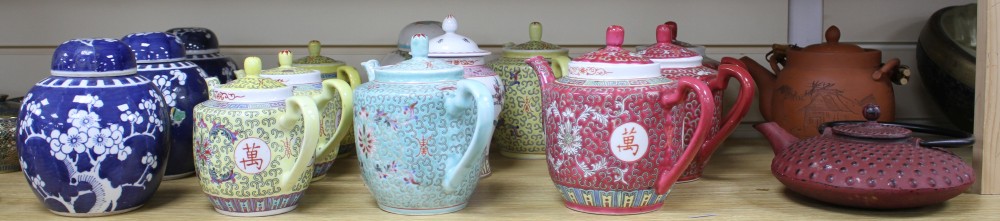 Three Chinese blue and white prunus pattern ginger jars, two other jars and ten assorted teapots